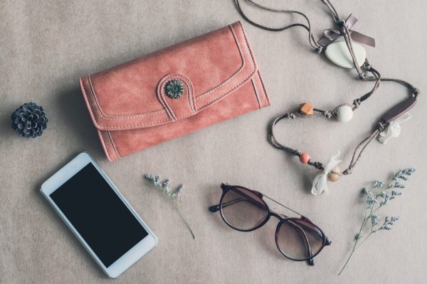 Fashion woman accessories isolated on color background